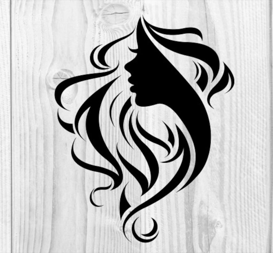 Silhouette of a woman with long flowing hair